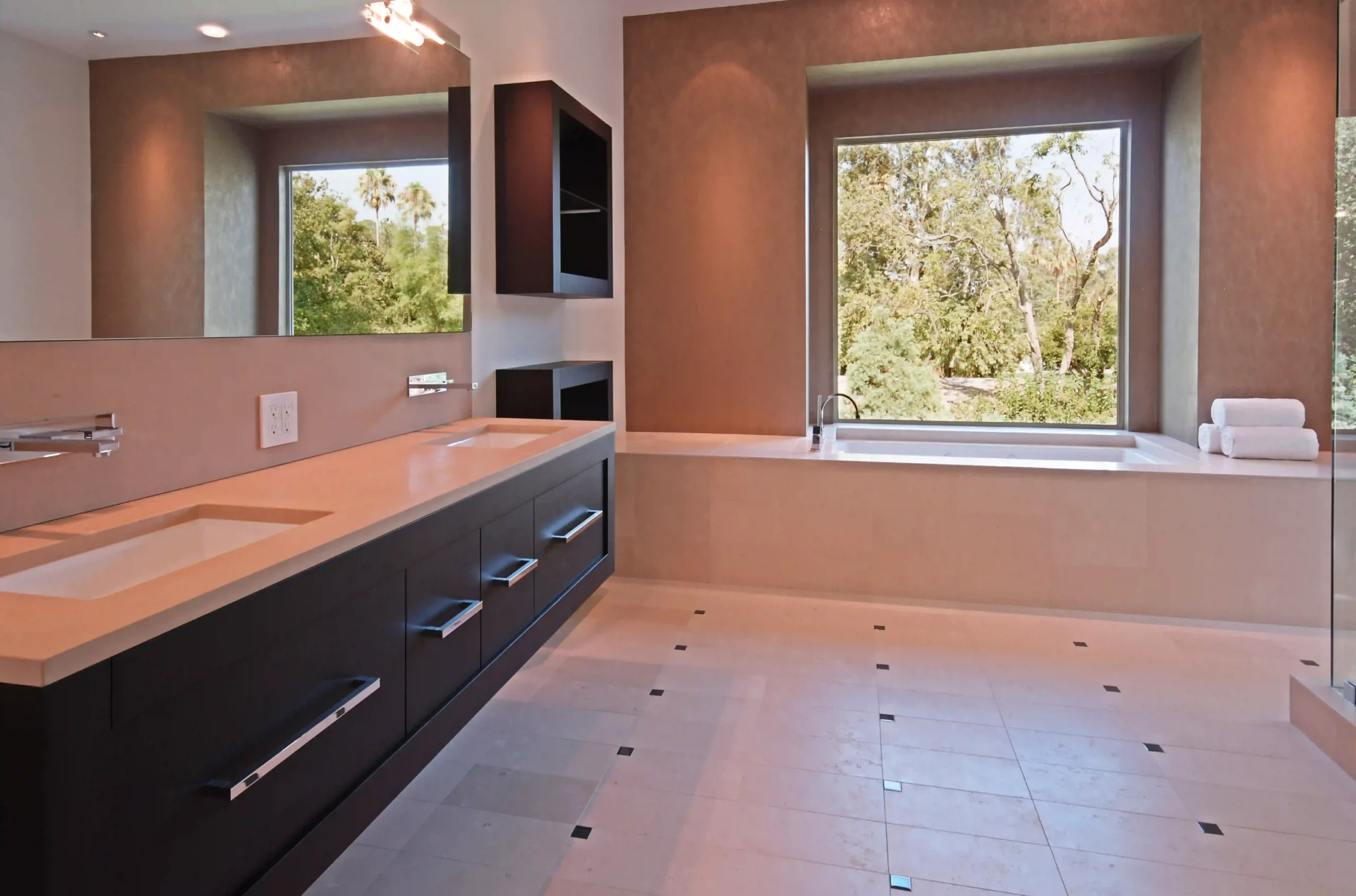 Modern bathroom with sleek fixtures and stylish tiles.