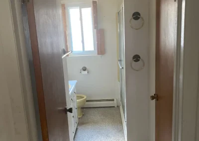 A spa-like bathroom featuring a freestanding tub and ambient lighting.