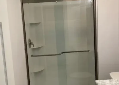 A family bathroom showcasing a bathtub and shower combination.